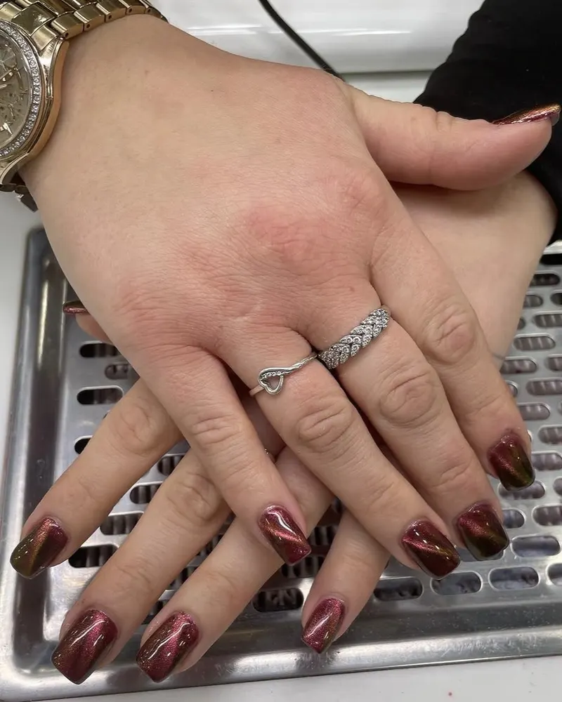 Burgundy cat eye gel nails