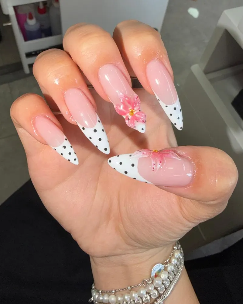 Black polka dot French tips with a 3D flower