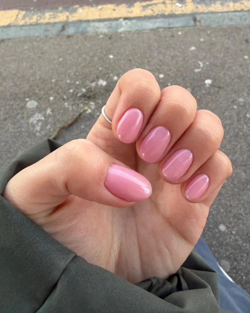 Glossy pink gel on natural nails